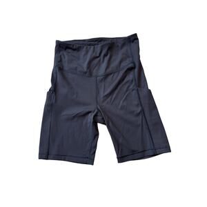 Athleta Ultimate Stash Pocket 7" short size XS, Black Biker shorts